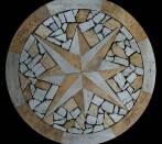 Rose of winds:travertine and pebbles.